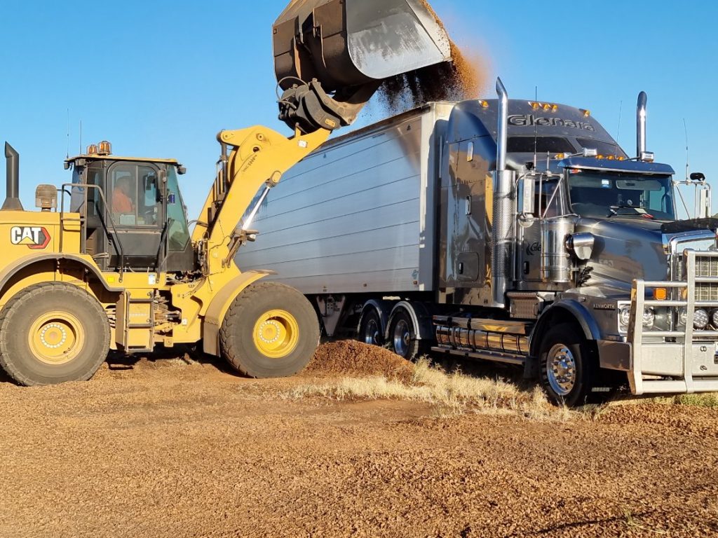 Glenara Transport Truck being loaded with product by Loader